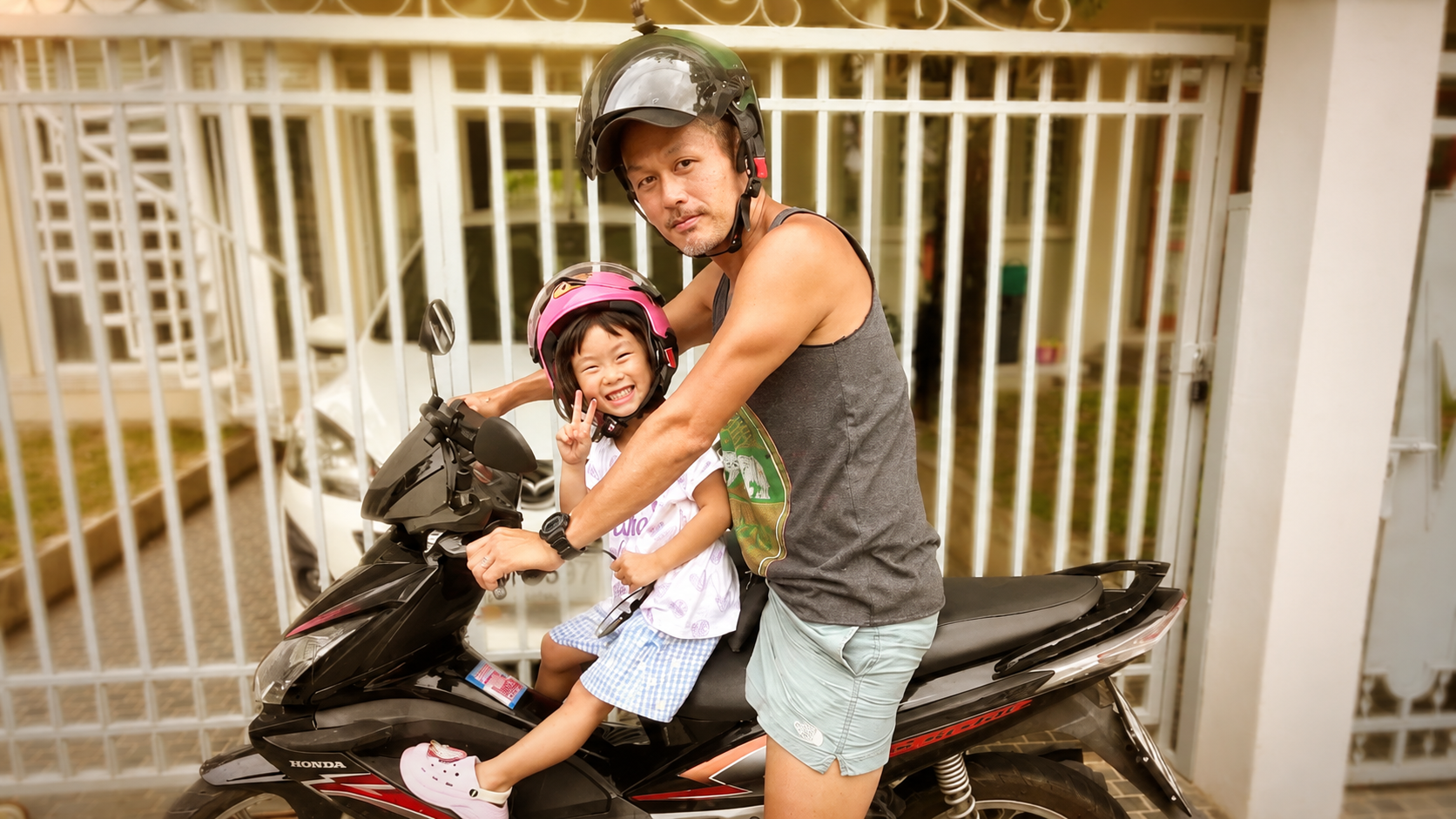 Living in Chiang Mai — riding a motorbike with my daughter