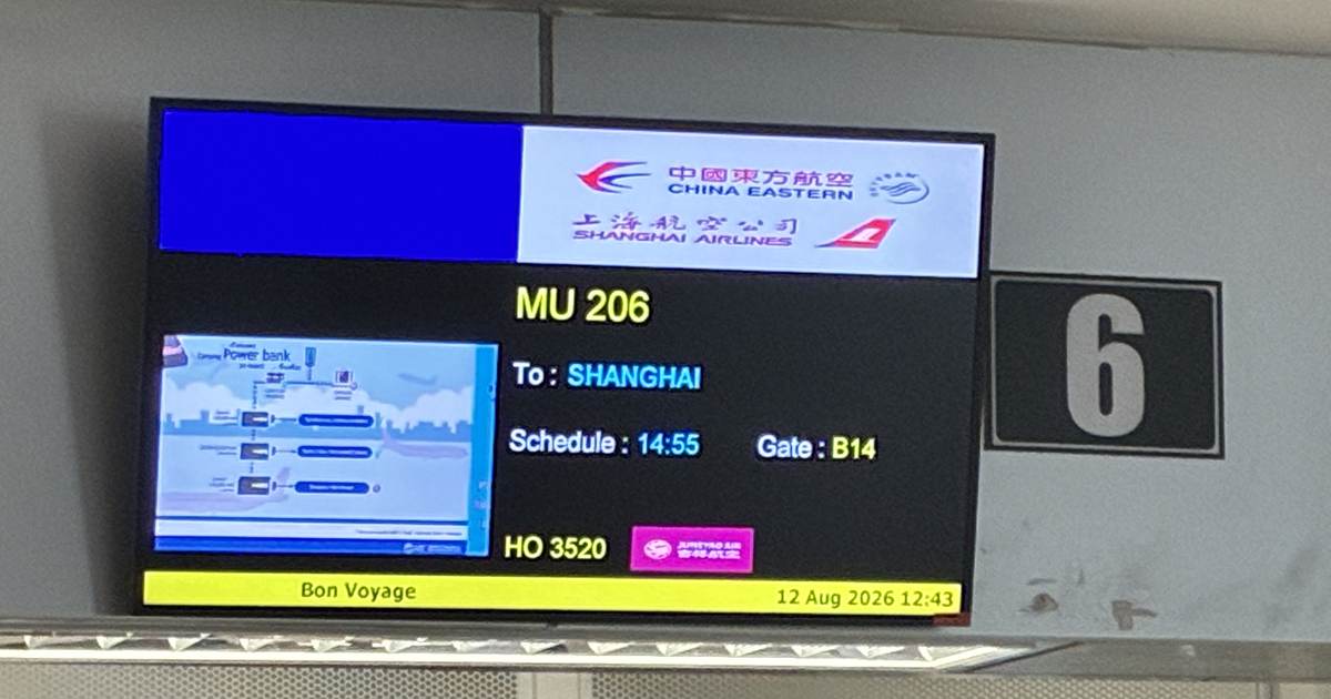 The departure board at Chiang Mai airport showing my China Eastern flight to Shanghai on 12 August 2026