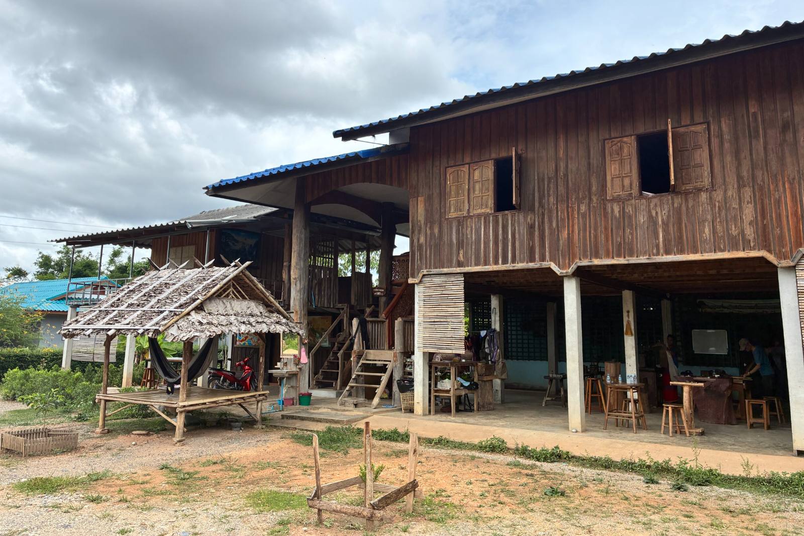 The Karen silver workshop: a wooden house on stilts with the work area underneath
